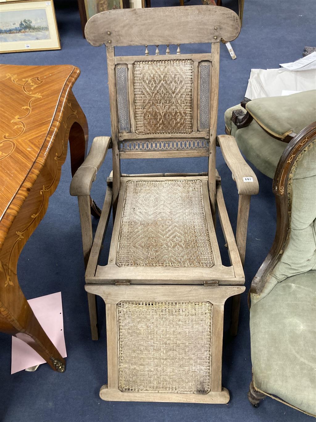 An Anglo Indian caned bleached hardwood steamer chair